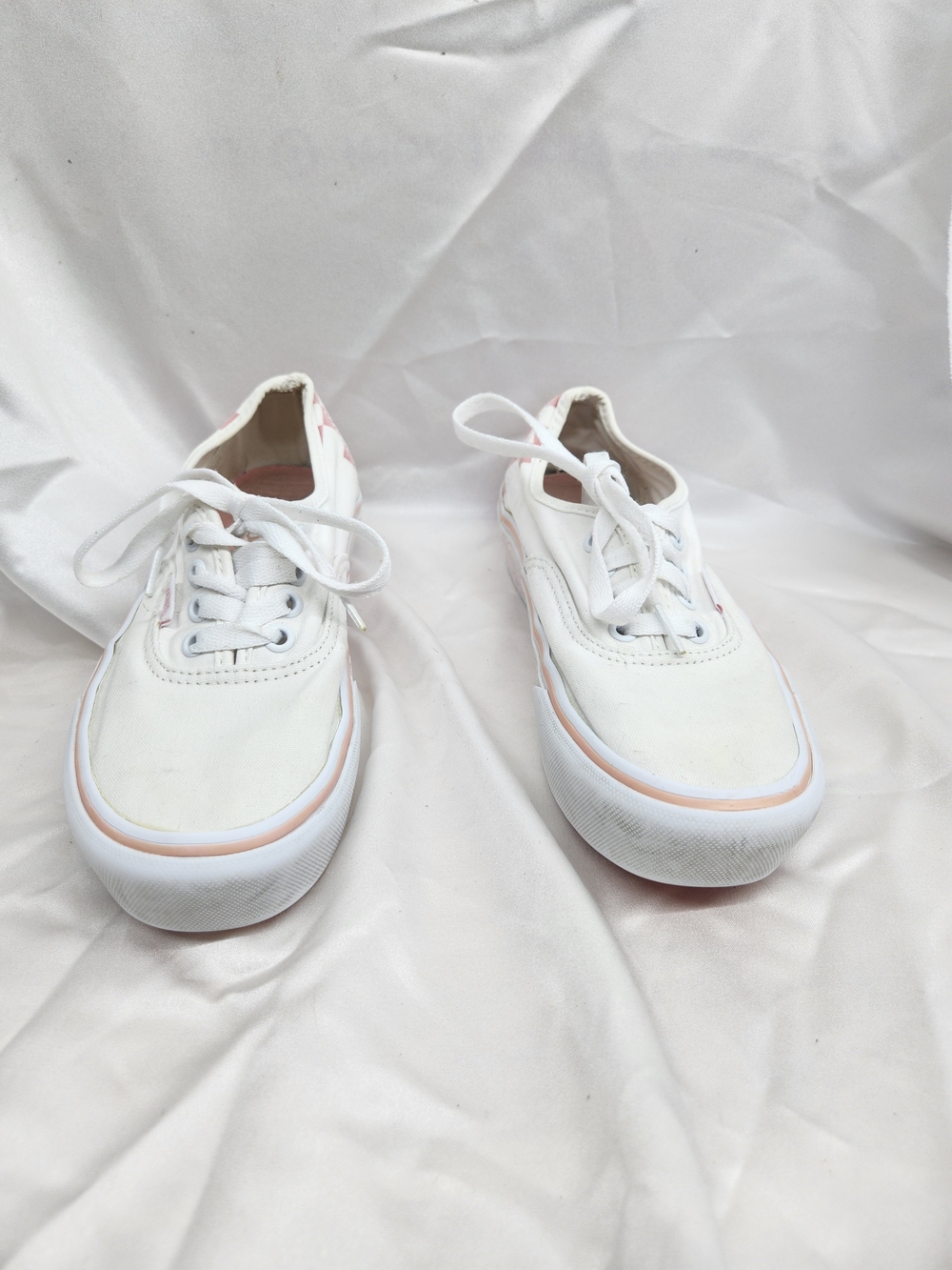 Vans Kids White Canvas Sneakers with Pink Accent